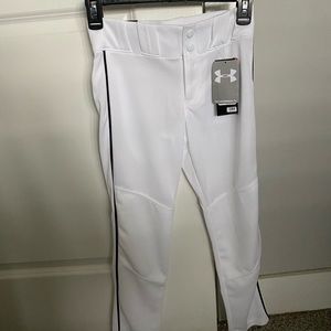 Under Armour White with Navy piping. New with tags. Size youth medium.